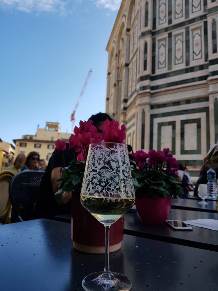 Wine and flowers on a table