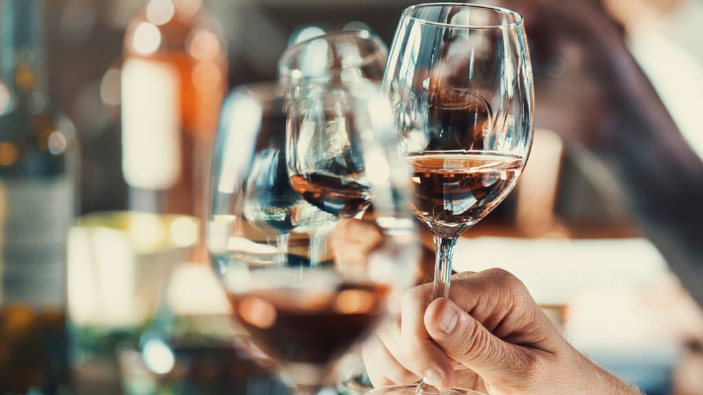 three glasses of rose wine