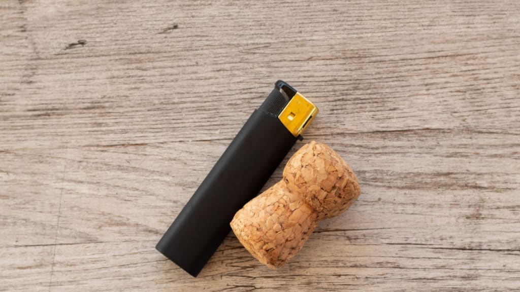 wine cork and a lighter