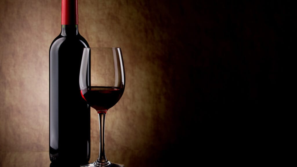 a bottle and a glass